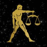 Graphic of a golden libra on a night sky background.