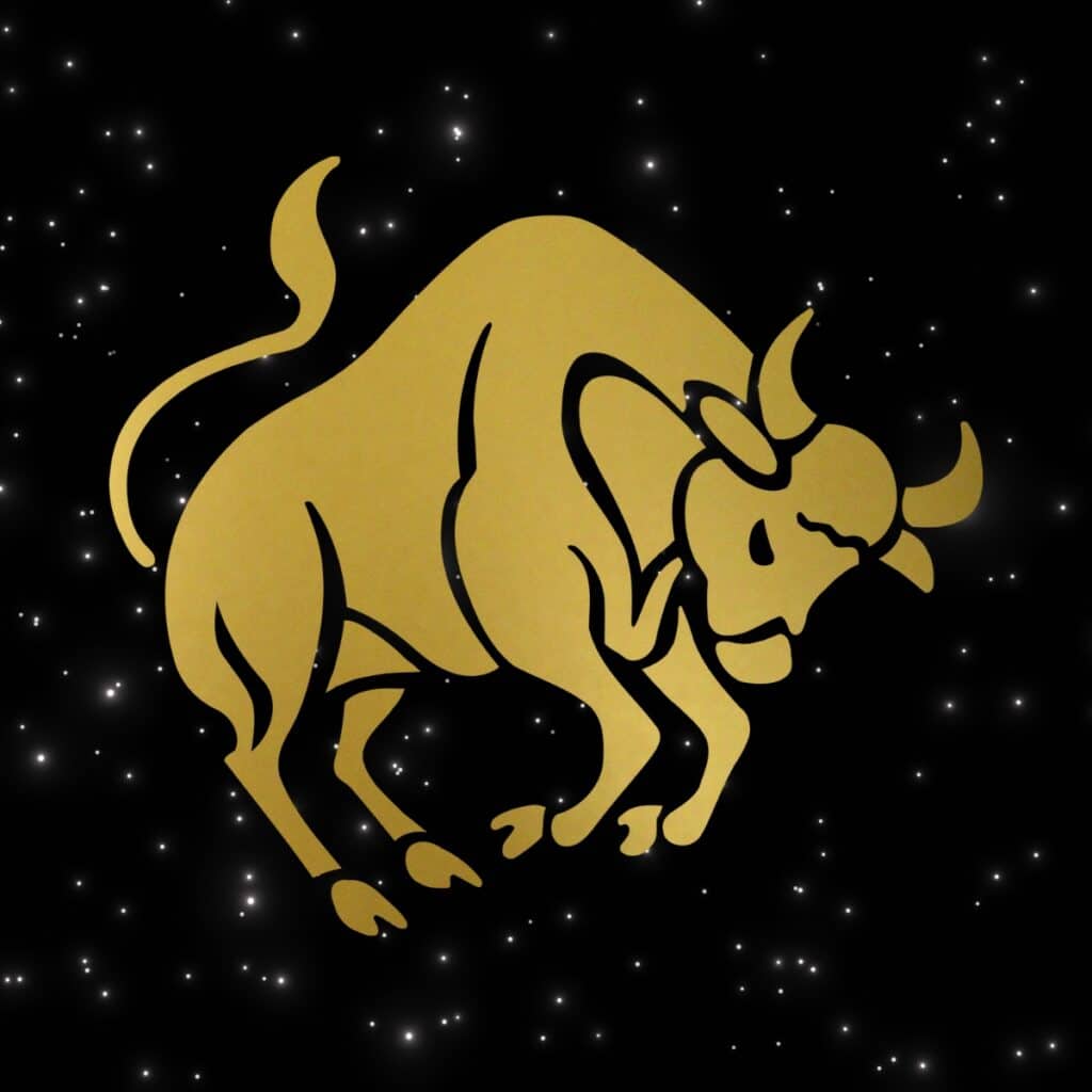 Graphic of a golden taurus on a night sky background.