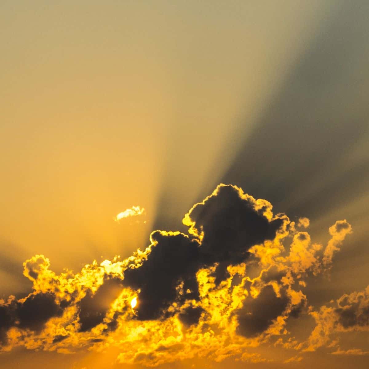 Sun behind clouds