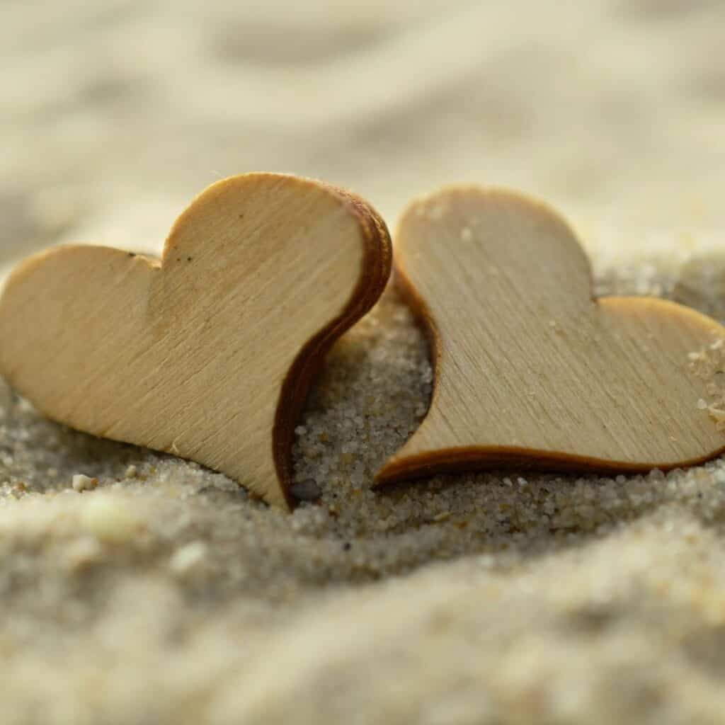 two hearts in the sand