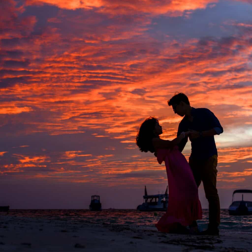 couple dancing sunset